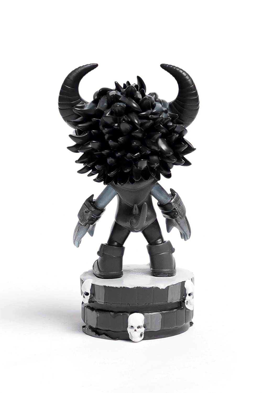Gothic demon figure with horns and skull base, showcasing a unique collectible design for fans of horror art.