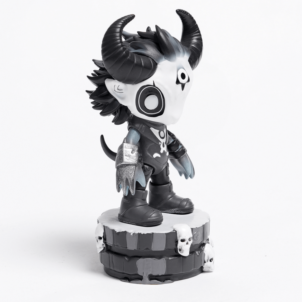 Gothic demon figure with horns and skull base, perfect for collectors and spooky decor enthusiasts.