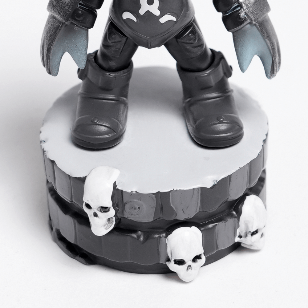 Gothic demon figure with horns standing on a spooky skull-base collectible, perfect for dark fantasy fans.
