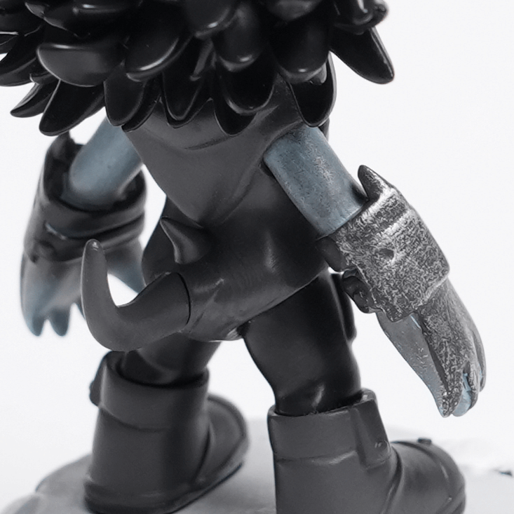 Gothic demon figure showcasing detailed horns, skull base, and menacing claw hand for collectors.