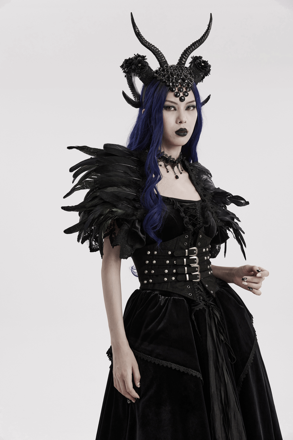 Gothic demon horn headwear adorned with glitter flowers, perfect for cosplay or dark glamour.