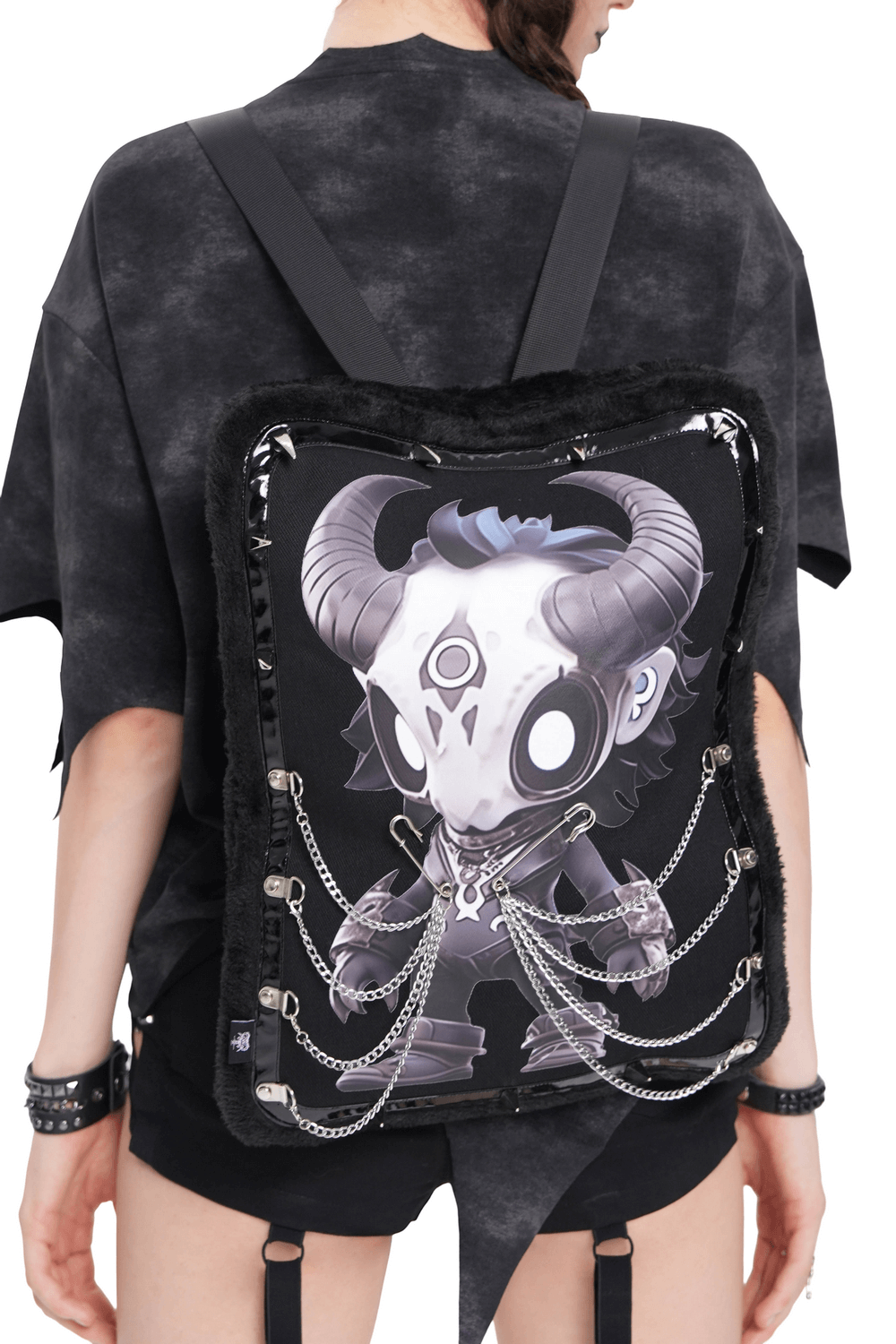 Gothic Demon Skull Backpack with Chains and Fur Trim worn on a model's back with striking graphic design.