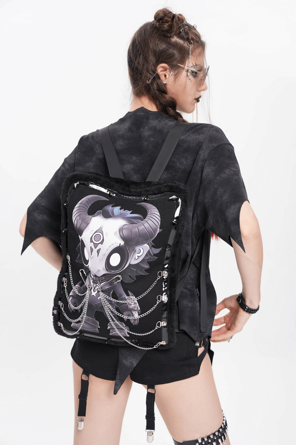 Gothic Demon Skull Backpack with Chains and Fur Trim showcased on a model, featuring unique artwork and stylish design.