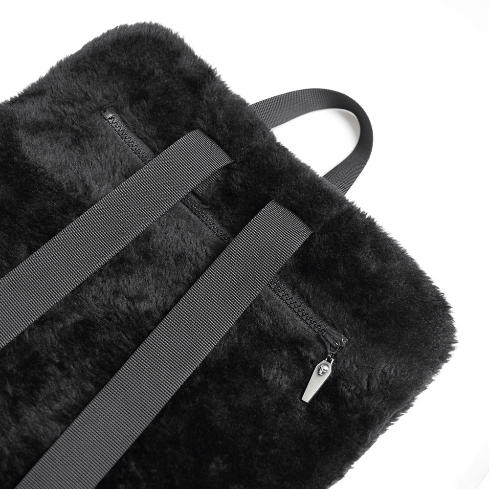 Gothic Demon Skull Backpack with Chains and Fur Trim, featuring a soft fur texture and adjustable straps.