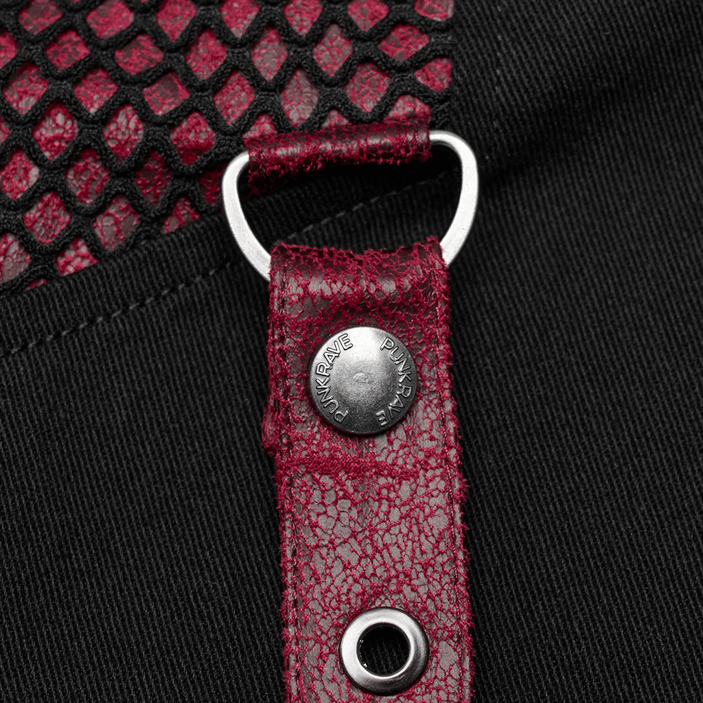 Close-up of Gothic style trousers with detachable faux leather strap and mesh panel detailing.