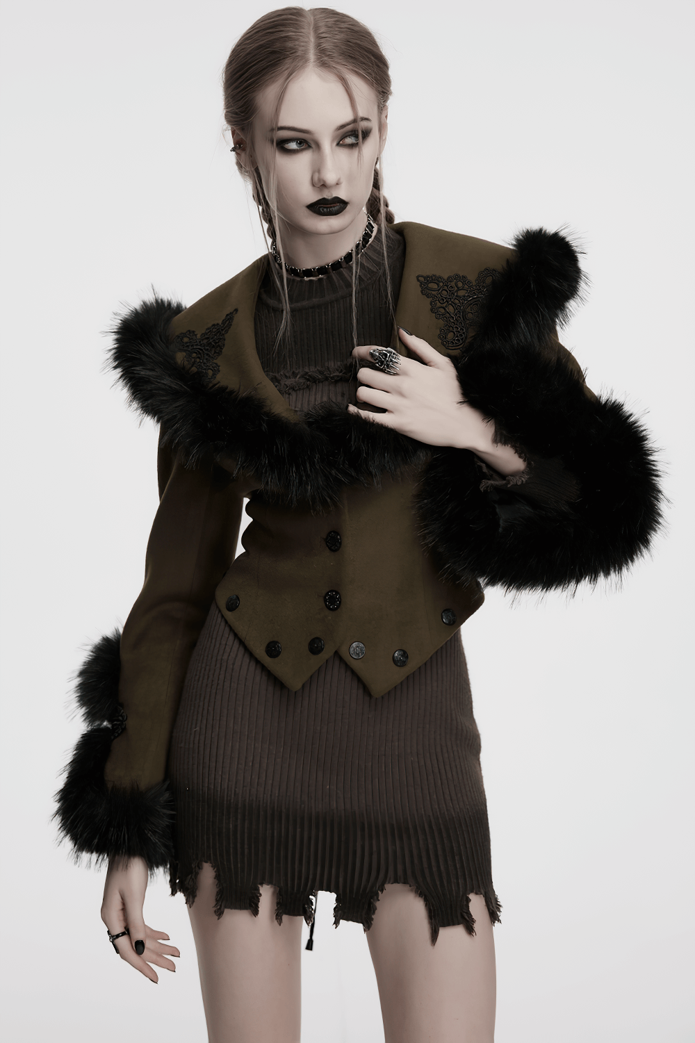 Gothic two-piece woolen coat with fur collar, vintage design, paired with a chic dark dress and a striking look.
