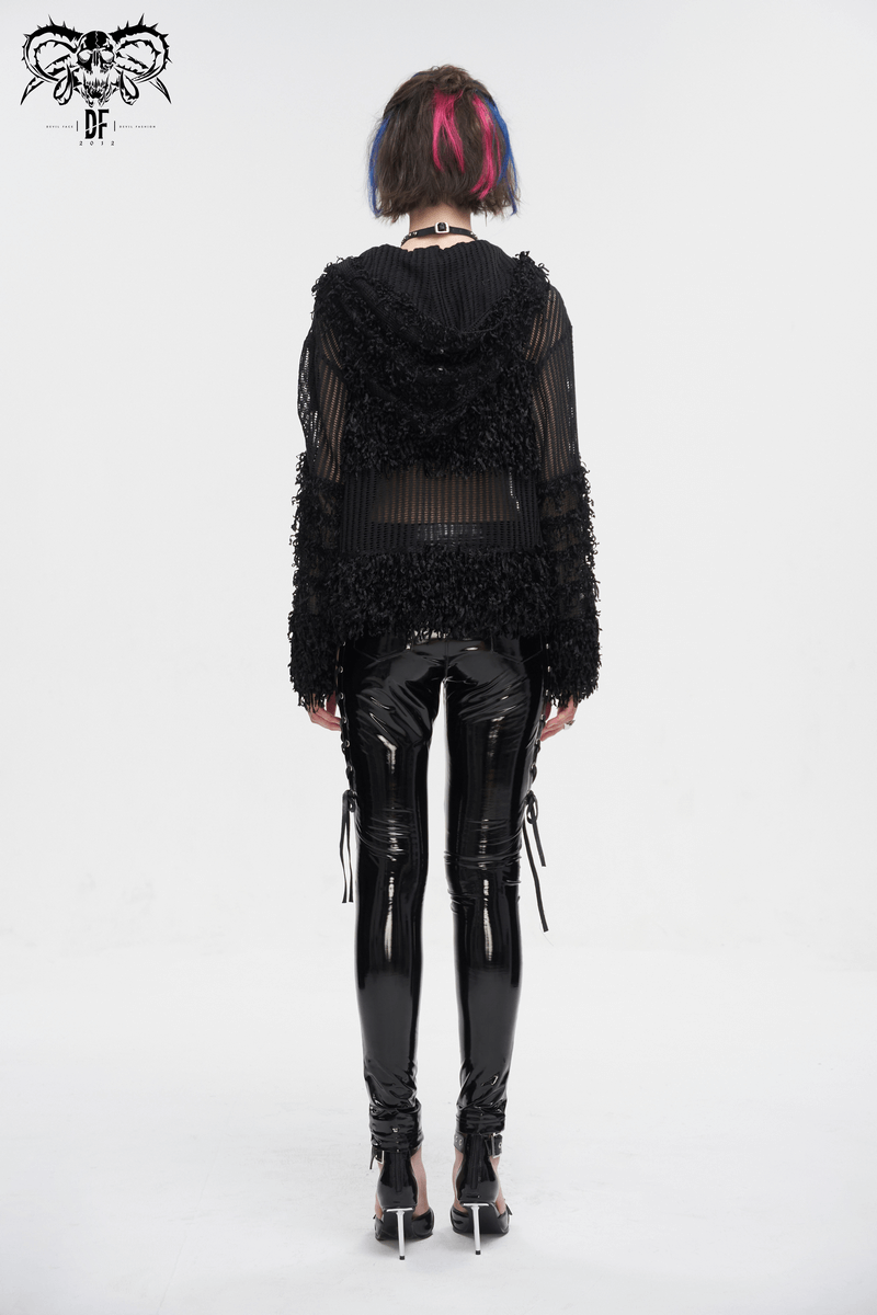 Back view of a gothic distressed sheer sweater with a hood and detachable chain, paired with shiny black leggings.