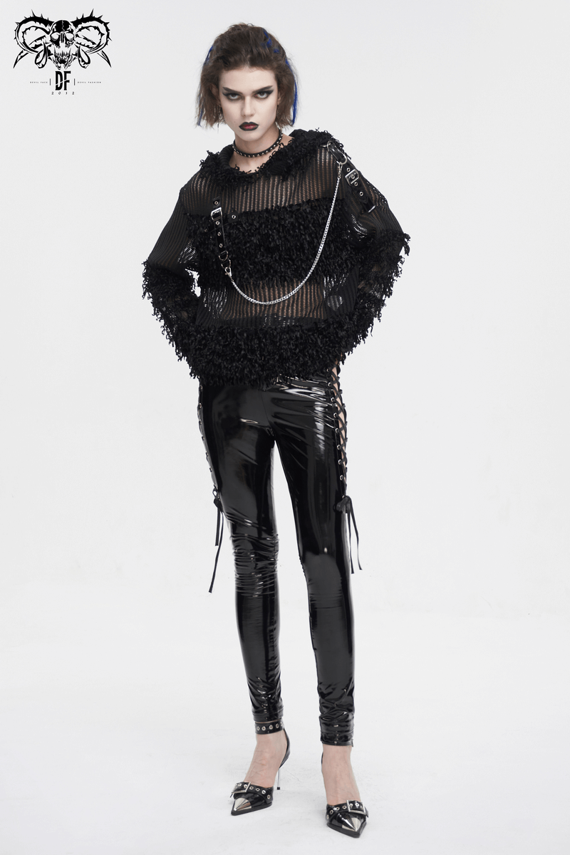 Gothic sheer sweater with detachable chain paired with shiny black pants for an edgy alternative fashion look.