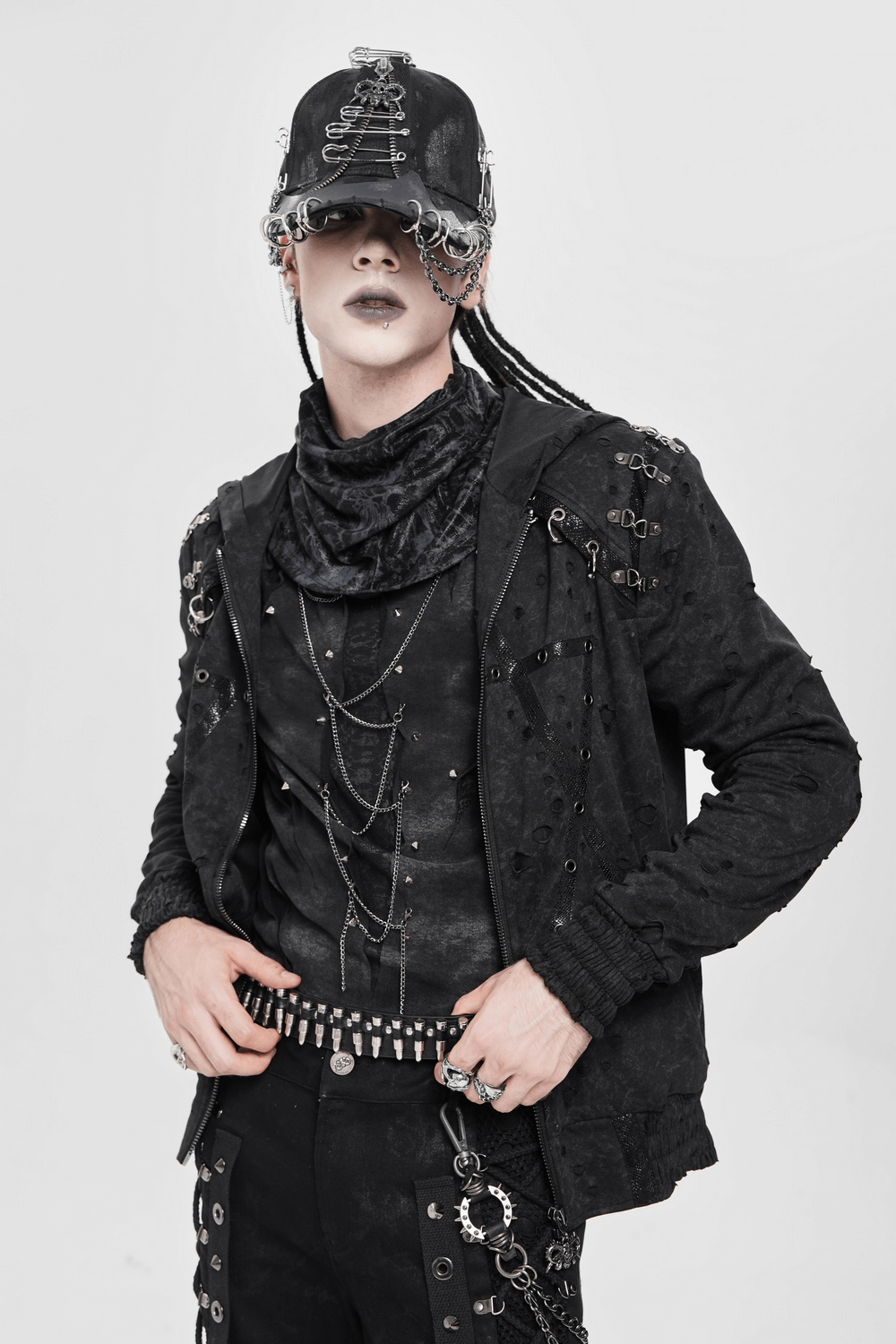 Gothic Distressed Zip Jacket with Rings and Spiked Back worn by a model in a punk rock outfit with metal details.