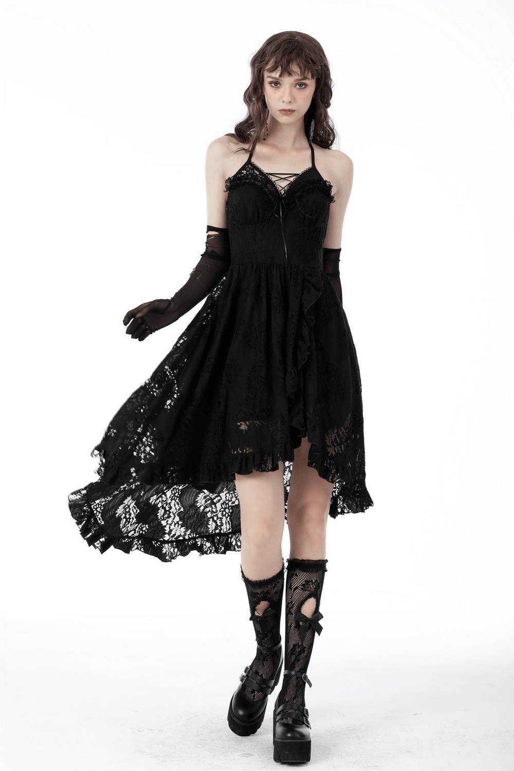 Gothic black lace hi-low dress with ruffles and tuxedo bodice, perfect for a romantic goth look.