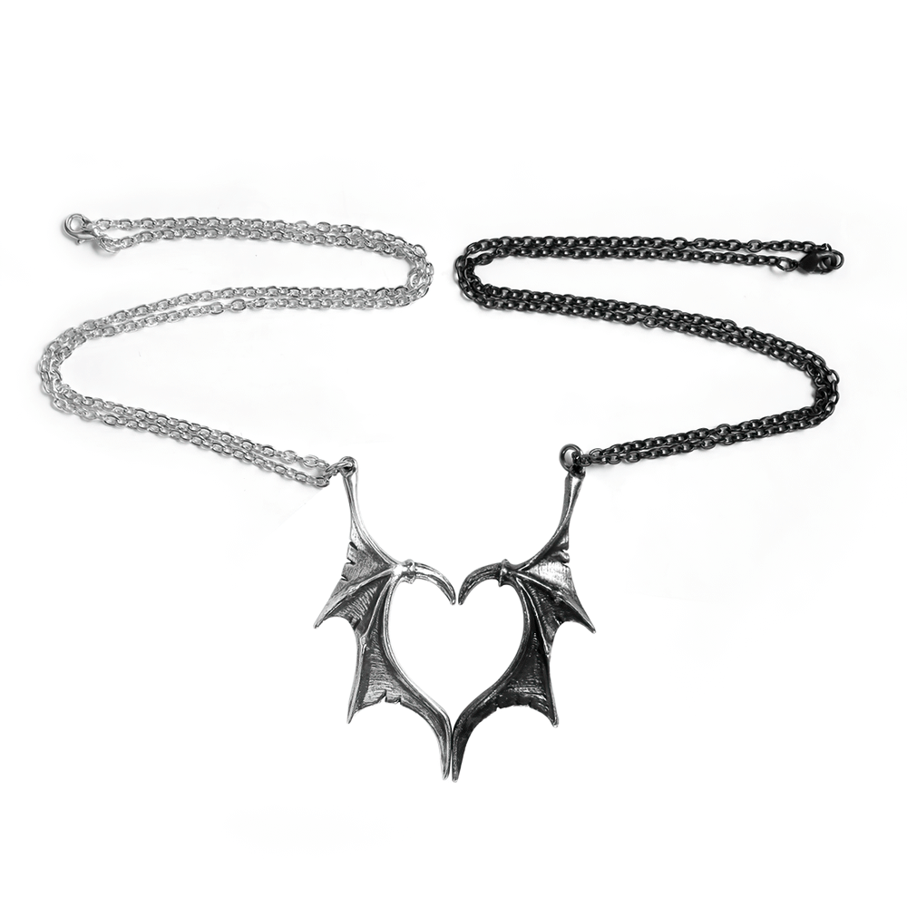 Gothic dragon wing heart pendant set for couples, featuring black and silver chains embodying dark romance.