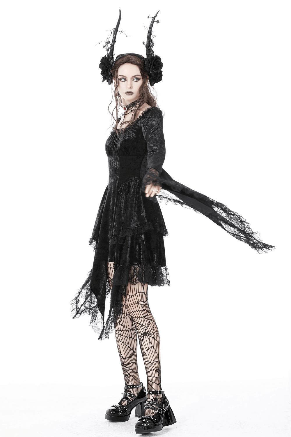 Gothic Dramatic Black Velvet Lace Asymmetrical Dress worn with lace bell sleeves and a dramatic silhouette.