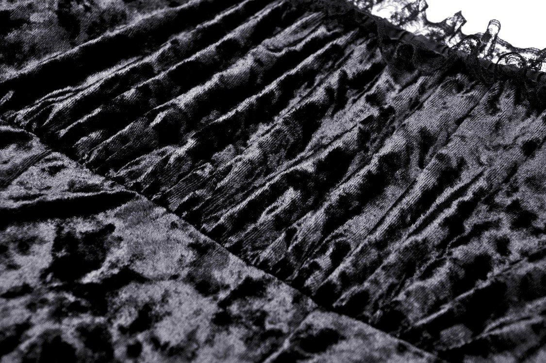 Close-up of black velvet fabric showcasing the texture of the Gothic Dramatic Black Velvet Lace Asymmetrical Dress.