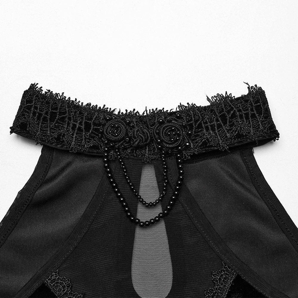 Elegant black lace collar with intricate bead detailing on a Gothic dress neckline.