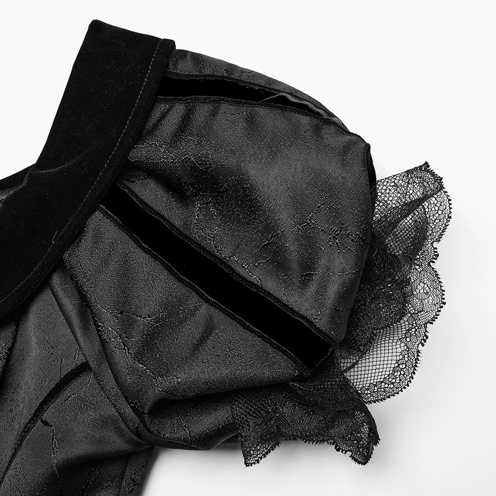 Close-up of gothic ball gown off-shoulder collar and lace bubble sleeve details in elegant velvet and jacquard fabric.