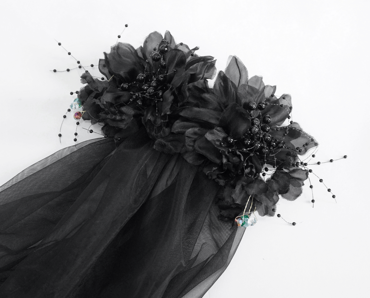Gothic elegant black veil with floral hair clip, perfect for a bridal look with a touch of mystery.