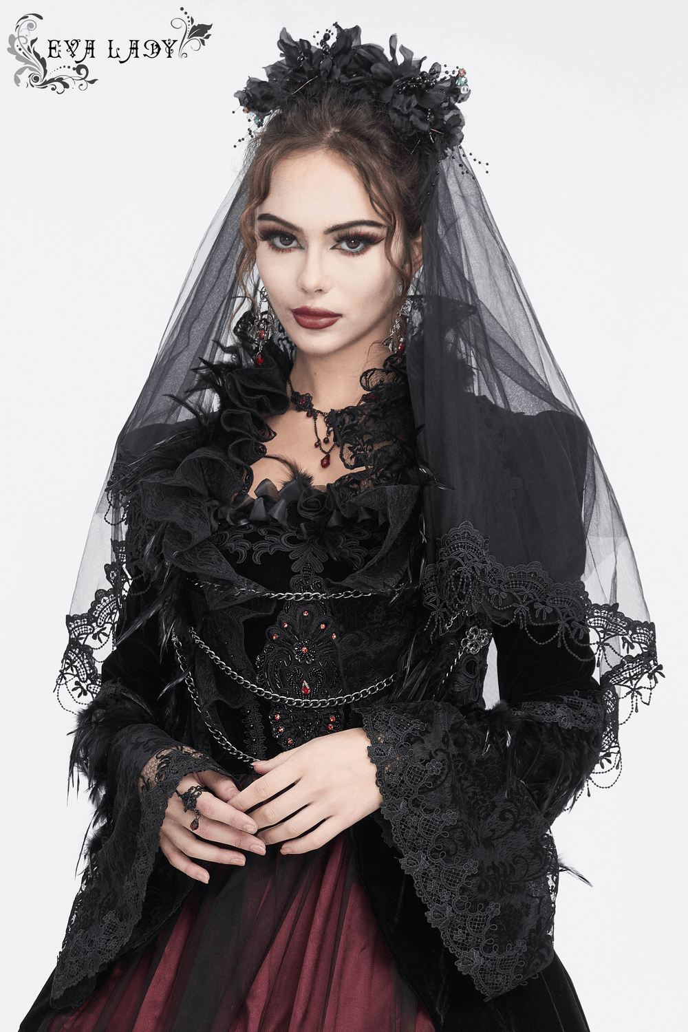Gothic elegant black veil with flower hair clip, perfect for a dramatic bridal look.
