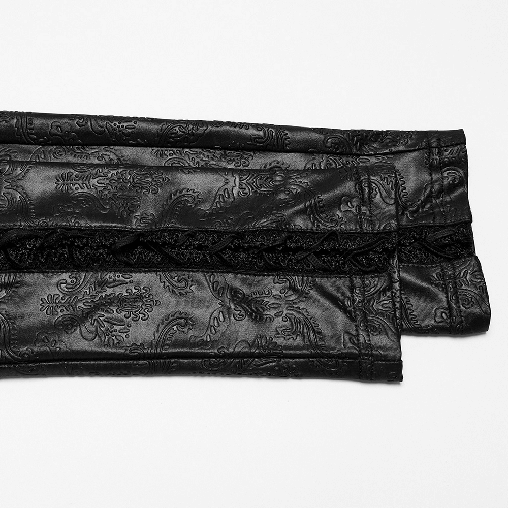 Gothic embossed rubberized fabric showcasing intricate butterfly patterns and stylish drawstrings for edgy leggings.