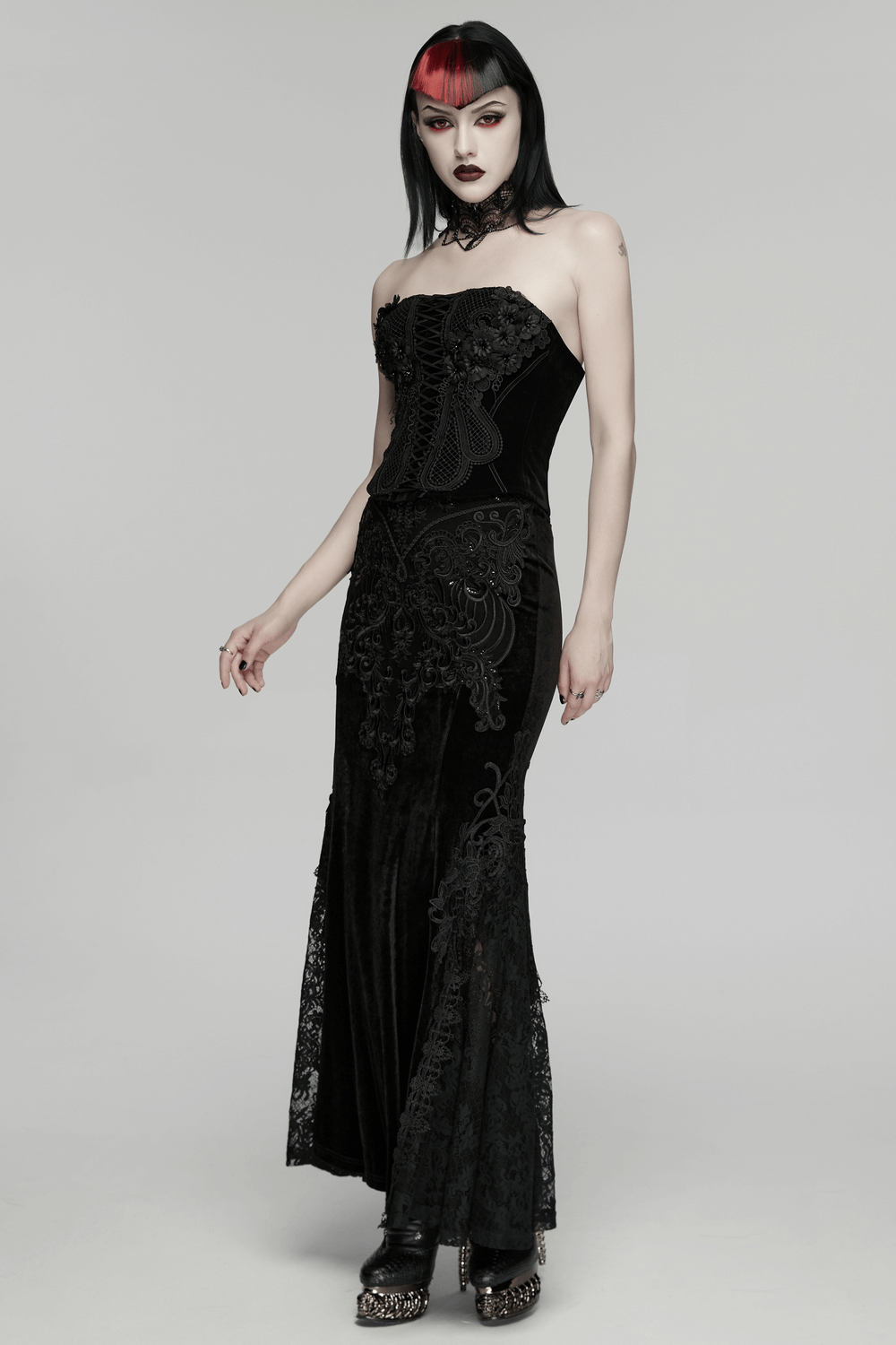 Gothic Embroidered Velvet Corset with Floral Lace worn by model, showcasing striking silhouette and delicate mesh details.