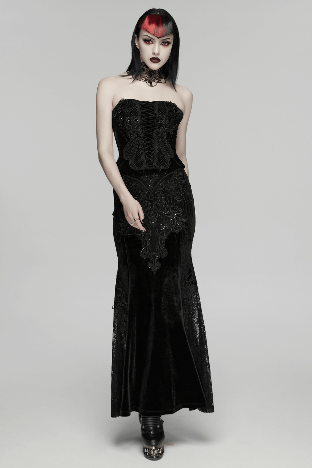 Gothic Embroidered Velvet Corset with Floral Lace worn by a model, showcasing intricate black lace and floral details.