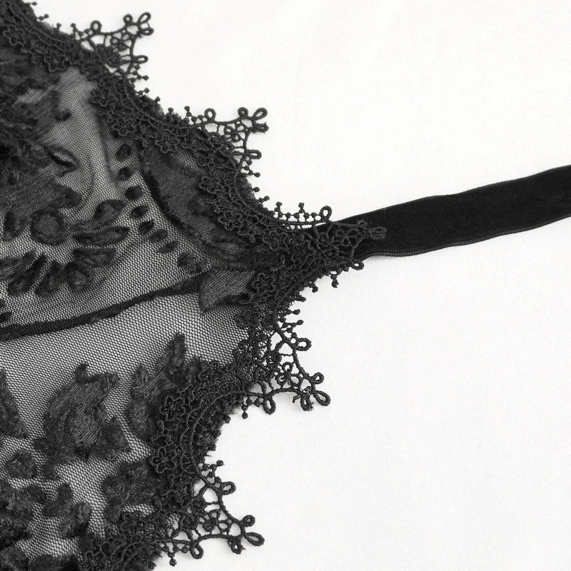 Close-up of black gothic lace with intricate embroidery and delicate edges, showcasing its luxurious detail.