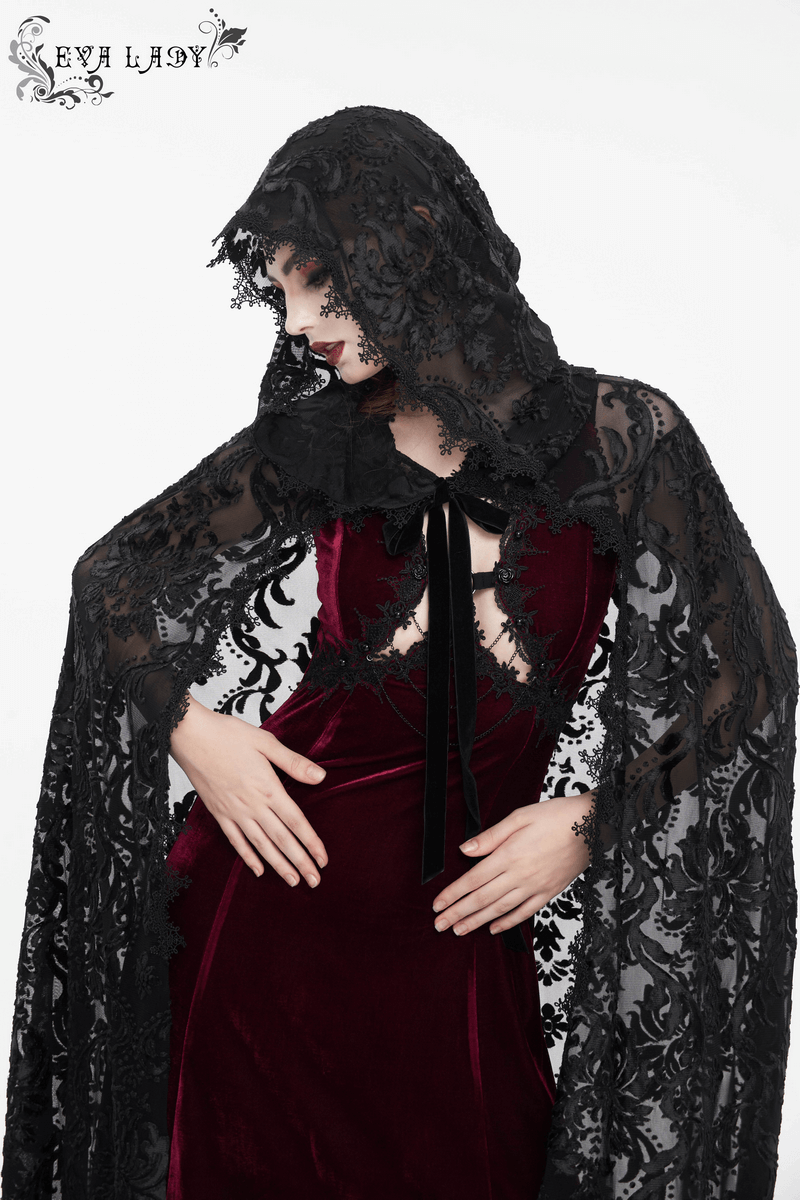 Gothic embroidery hooded cape with lace details, elegantly styled on a model in a dark velvet dress.