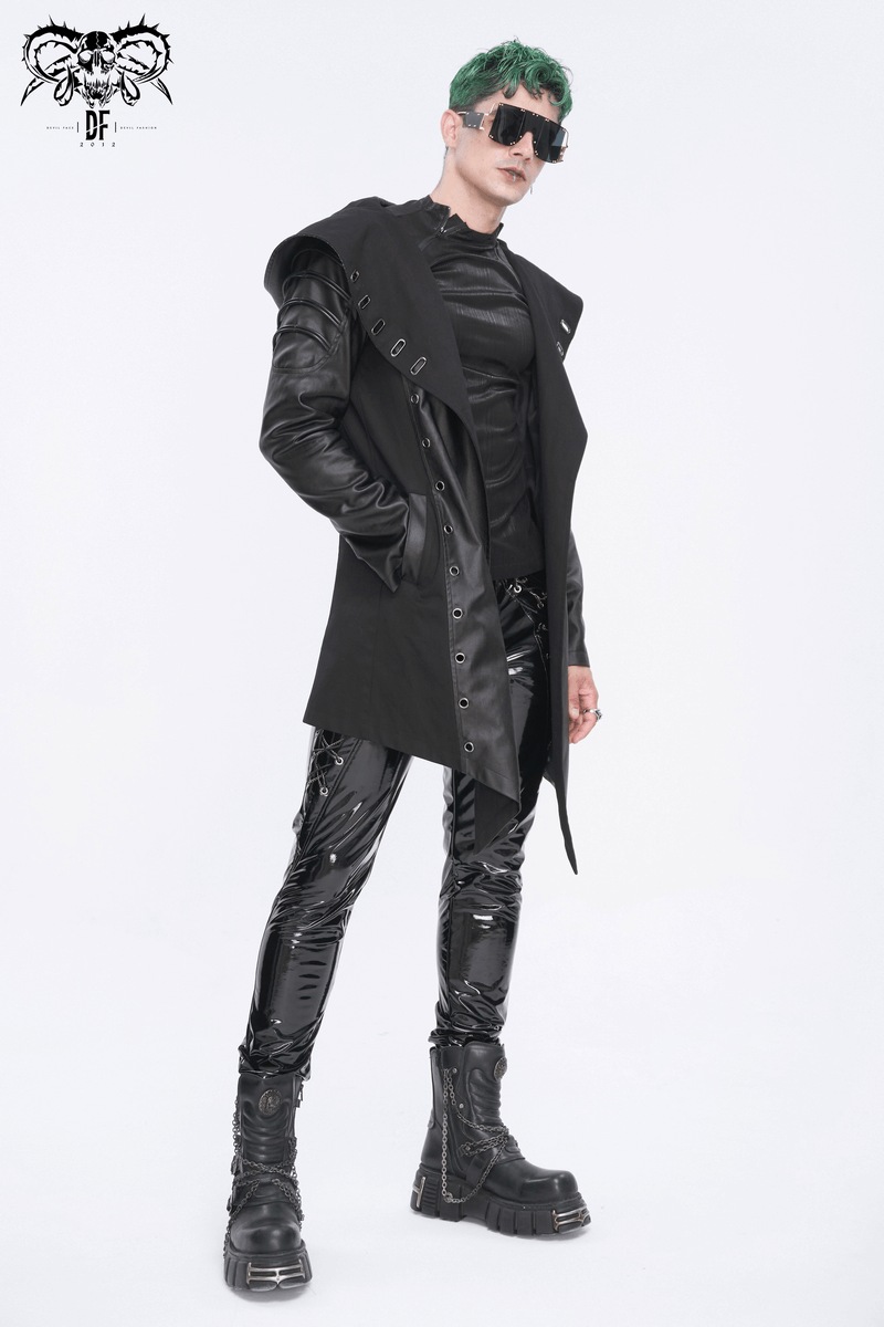 Gothic black irregular hooded coat with eyelets, stylishly worn by a model with green hair and sunglasses.