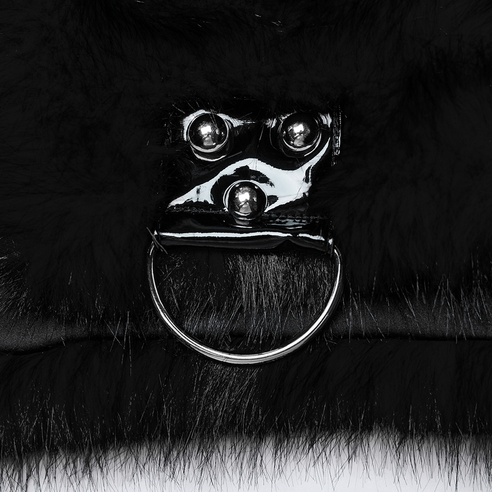 Close-up of goth-inspired faux fur with patent leather detailing and metal ring decoration.