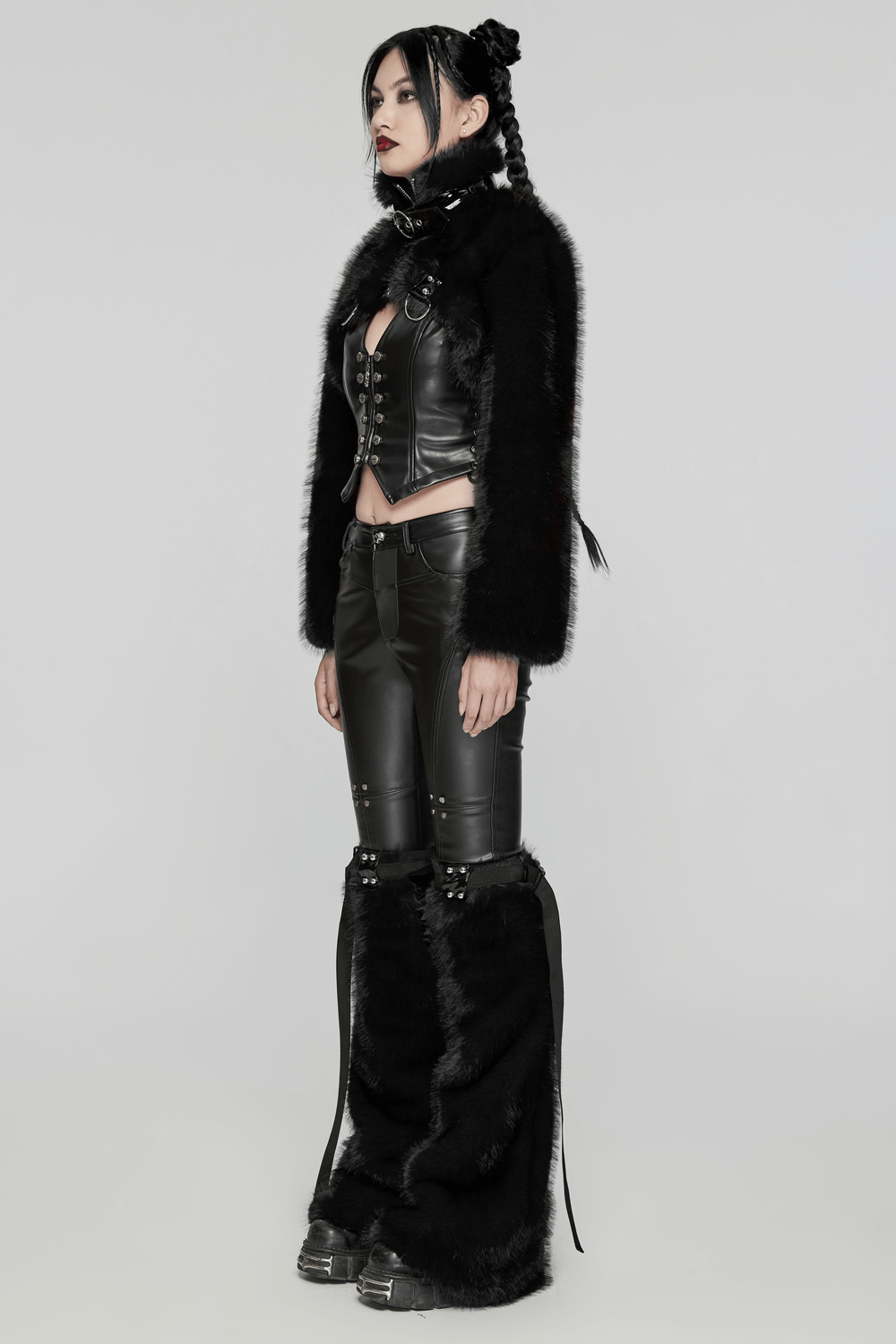 Model showcasing gothic faux fur cropped jacket with leather pants and edgy style, emphasizing punk fashion and rebellion.