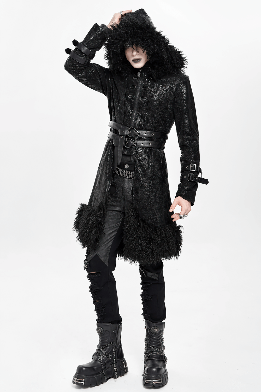 Gothic Faux Fur Hooded Trench Coat with Straps and Belts modeled in a striking pose, showcasing its dramatic hood and textured finish.