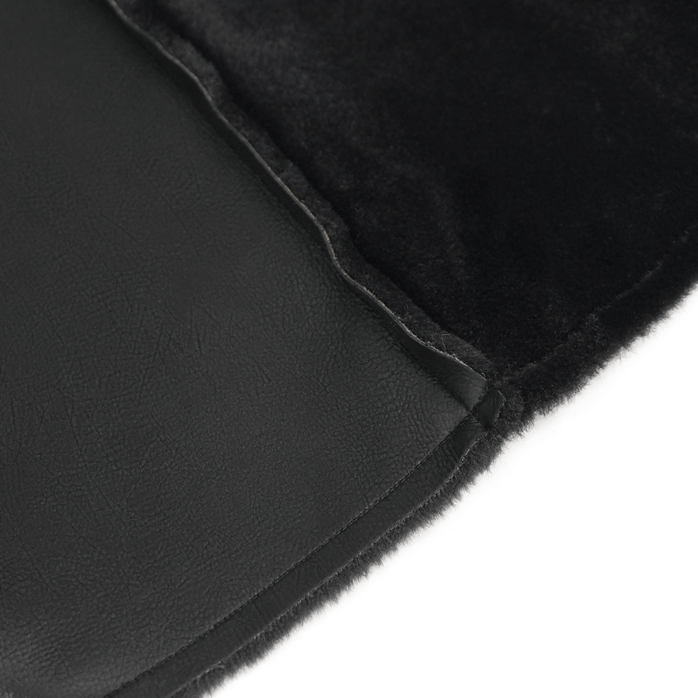 Close-up of Gothic faux leather and velvet fabric with stitching detail