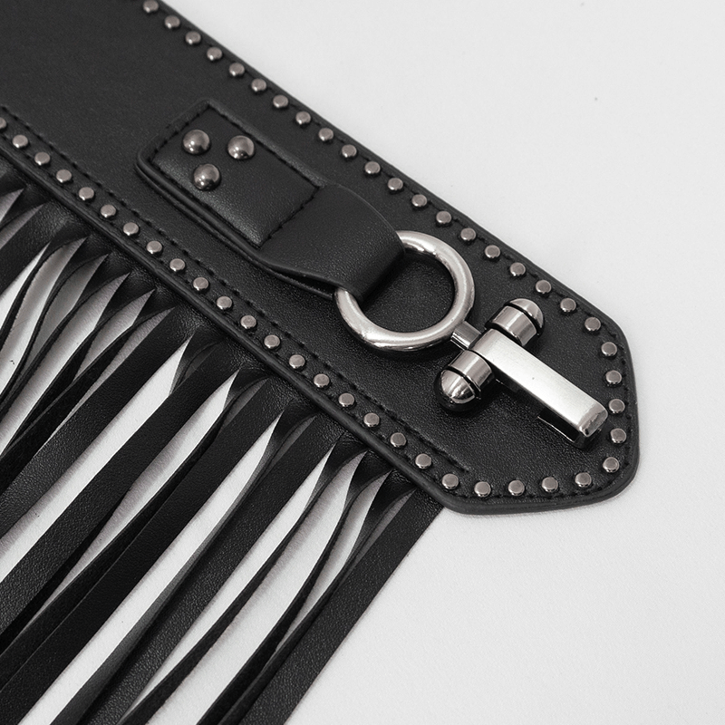 Close-up of black faux leather belt with studs, buckle, and long tassels, perfect for vintage style outfits.