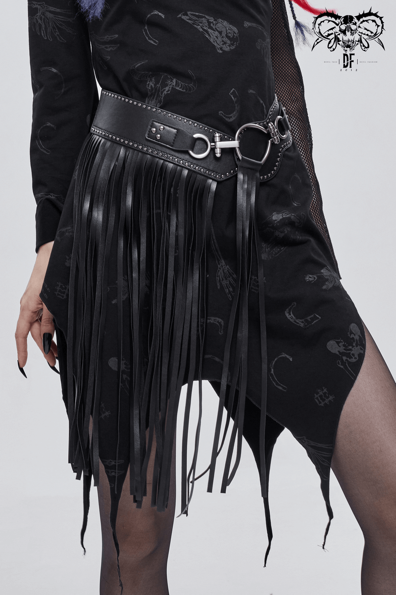 Gothic faux leather belt with buckles and long tassels, styled with a black dress for a vintage look.