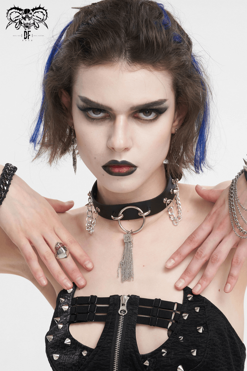 Model wearing a gothic faux leather choker with metallic tassels and edgy punk attire.
