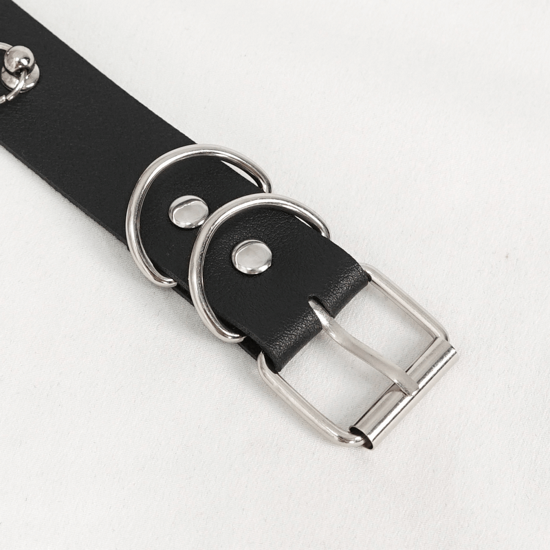 Close-up of a gothic faux leather choker with metallic hardware and stylish buckle, perfect for punk fashion.