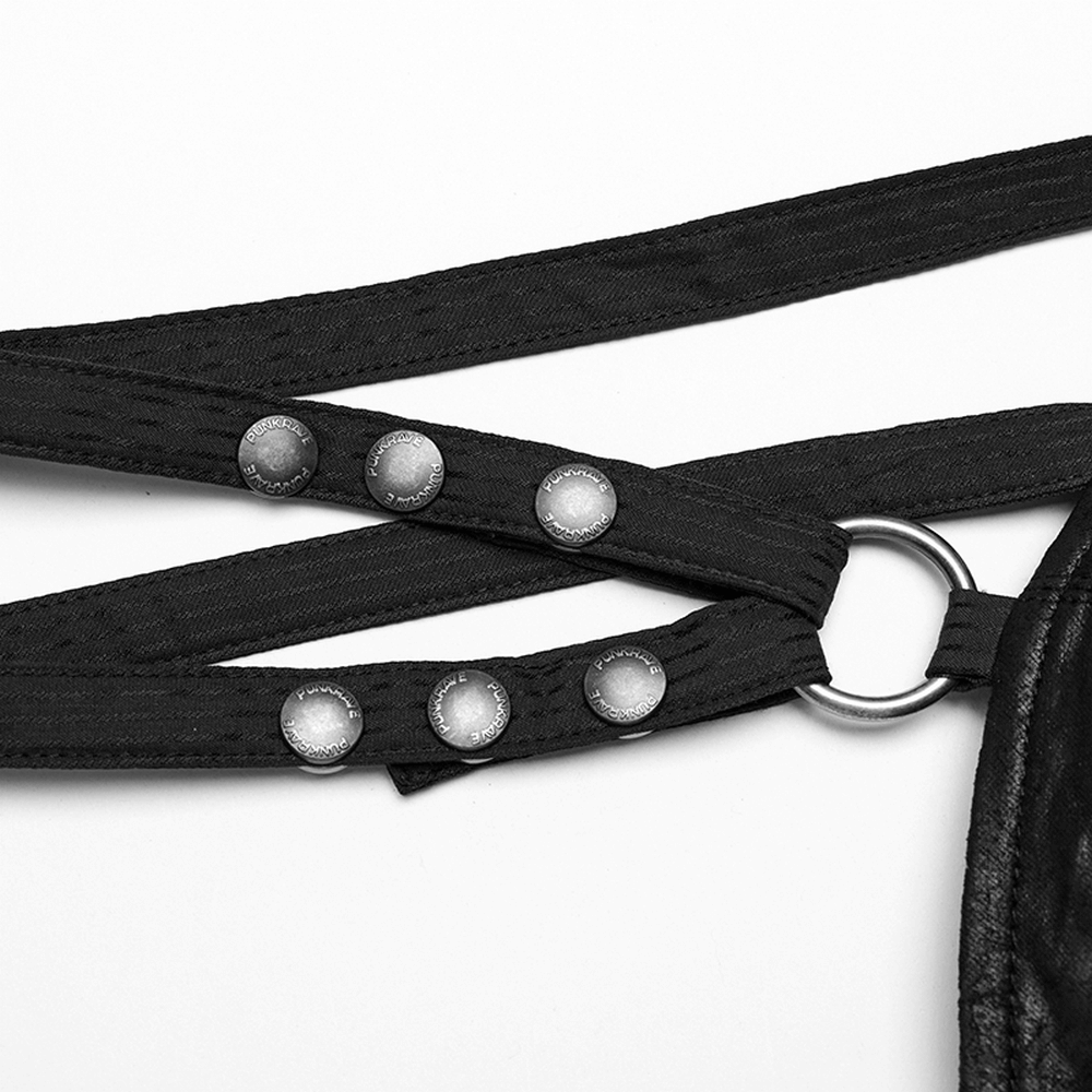 Close-up of adjustable black straps with silver buttons on a gothic corset top, showcasing edgy design details.