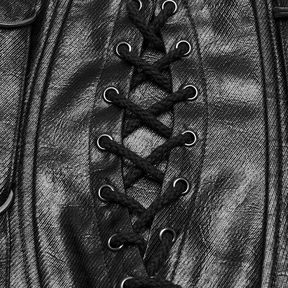 Close-up of a Gothic faux leather corset with intricate lace-up detailing and metallic accents.