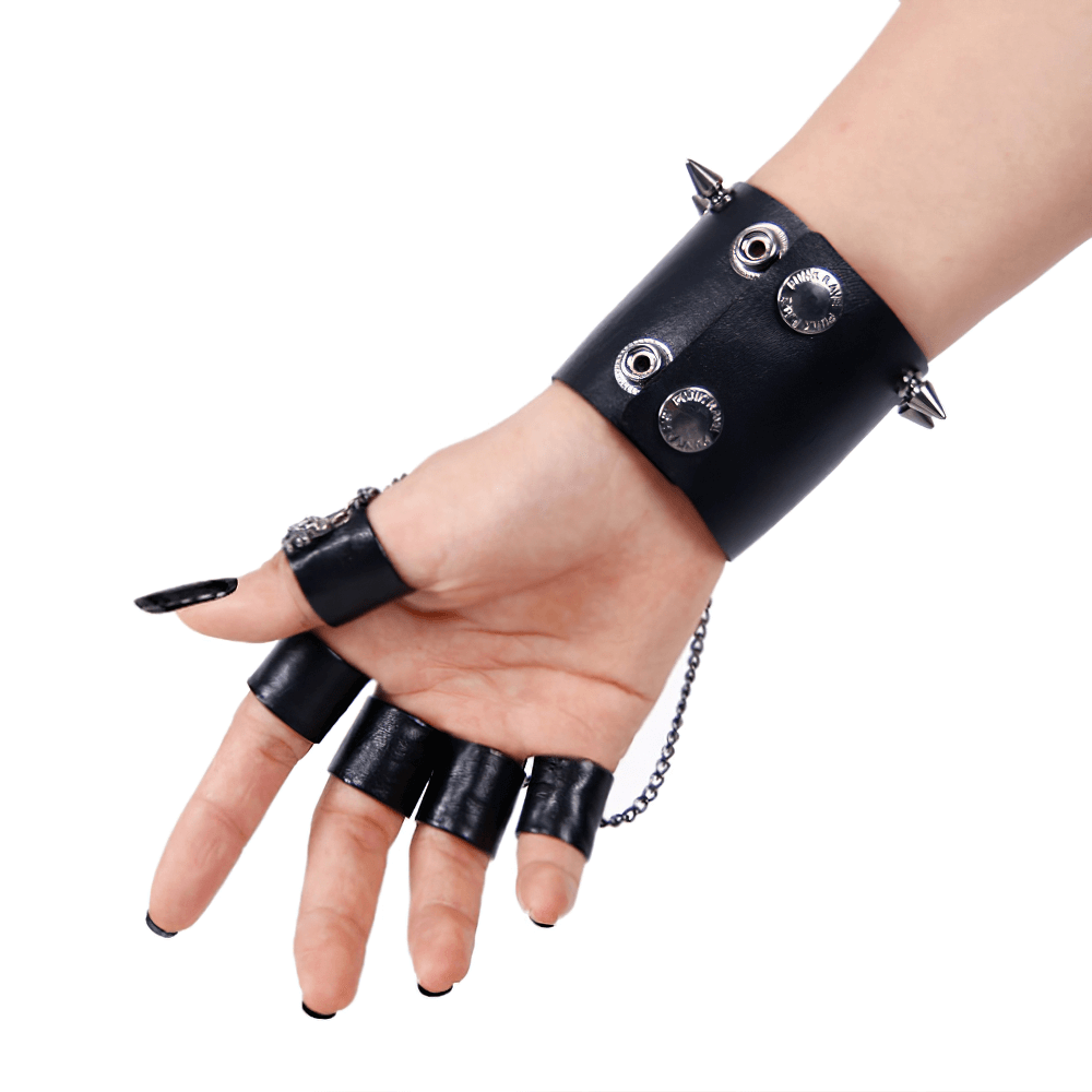 Gothic faux leather glove bracelet with skull, spikes, and chains for edgy style.