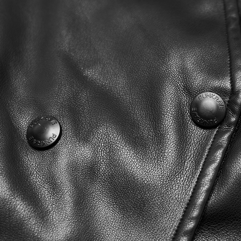 Close-up of black faux leather jacket with punk-style buttons, showcasing edgy details for gothic fashion.