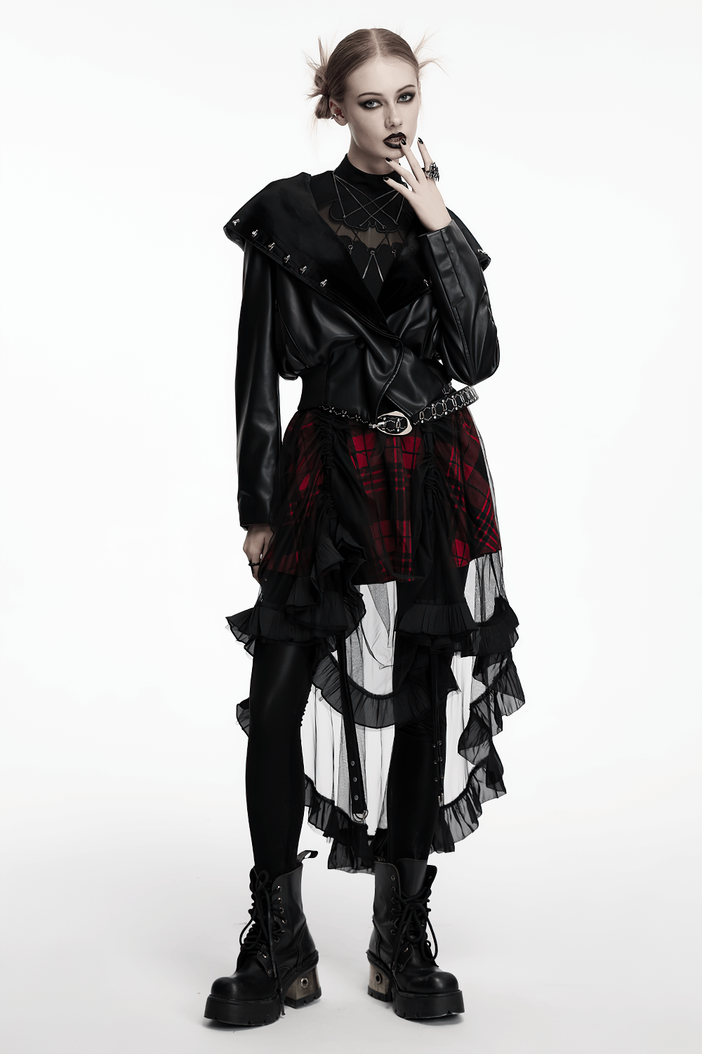 Gothic faux leather jacket with skull-studded brim paired with layered plaid skirt and combat boots for edgy punk style.