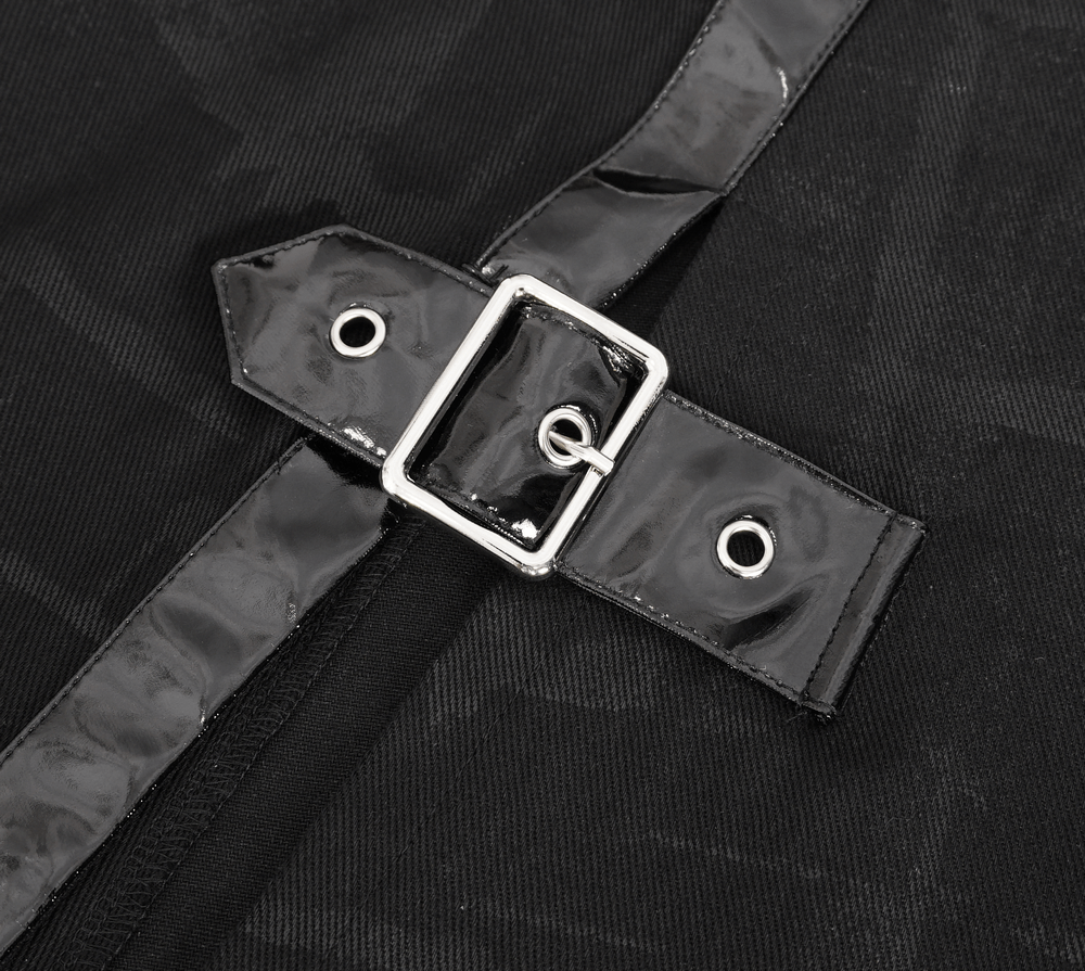 Close-up of a silver buckle and strap detail on a gothic faux leather kilt skirt, showcasing its stylish design.