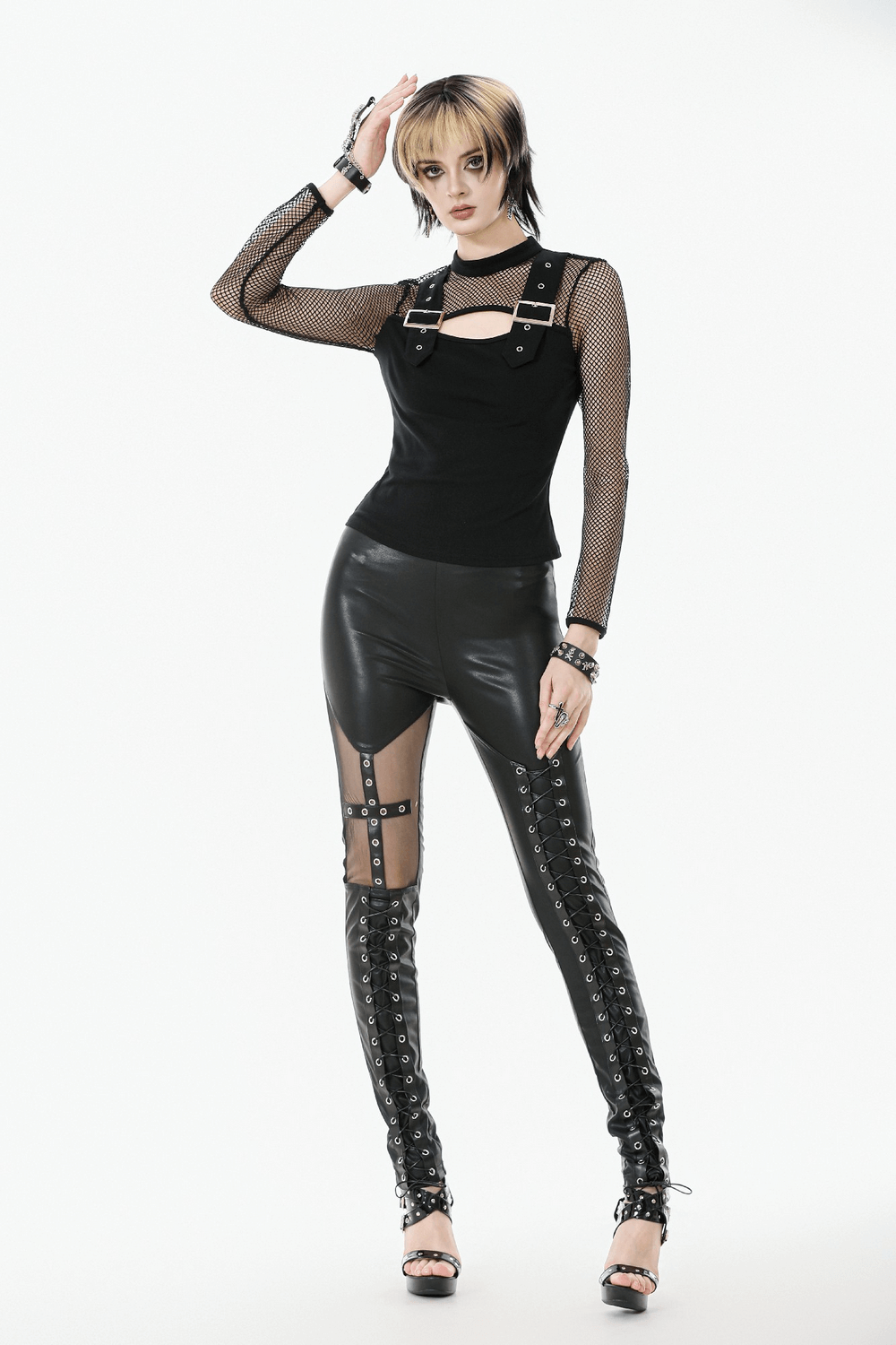 Gothic Faux Leather Pants with Mesh and Lace-Up Design showcasing a stylish punk look with lace-up detail and fishnet top.