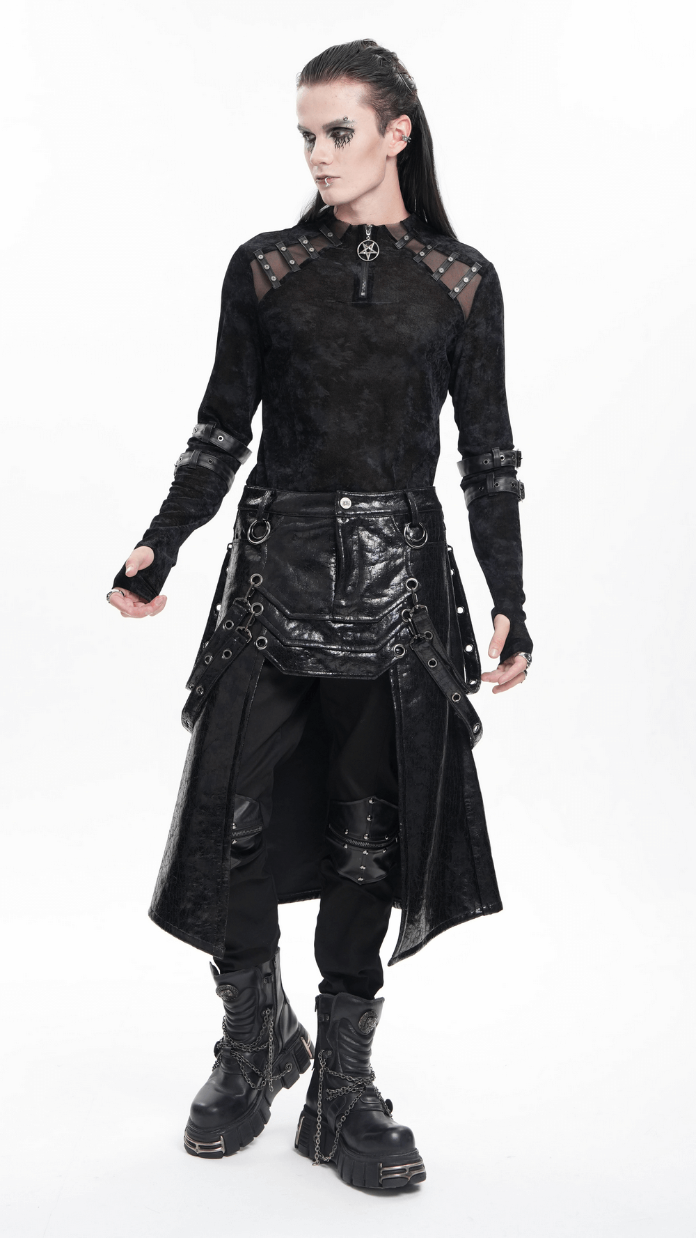 Gothic faux leather skirt with straps and buckles, styled for punk fashion, accessorized with boots and metal ring accents.