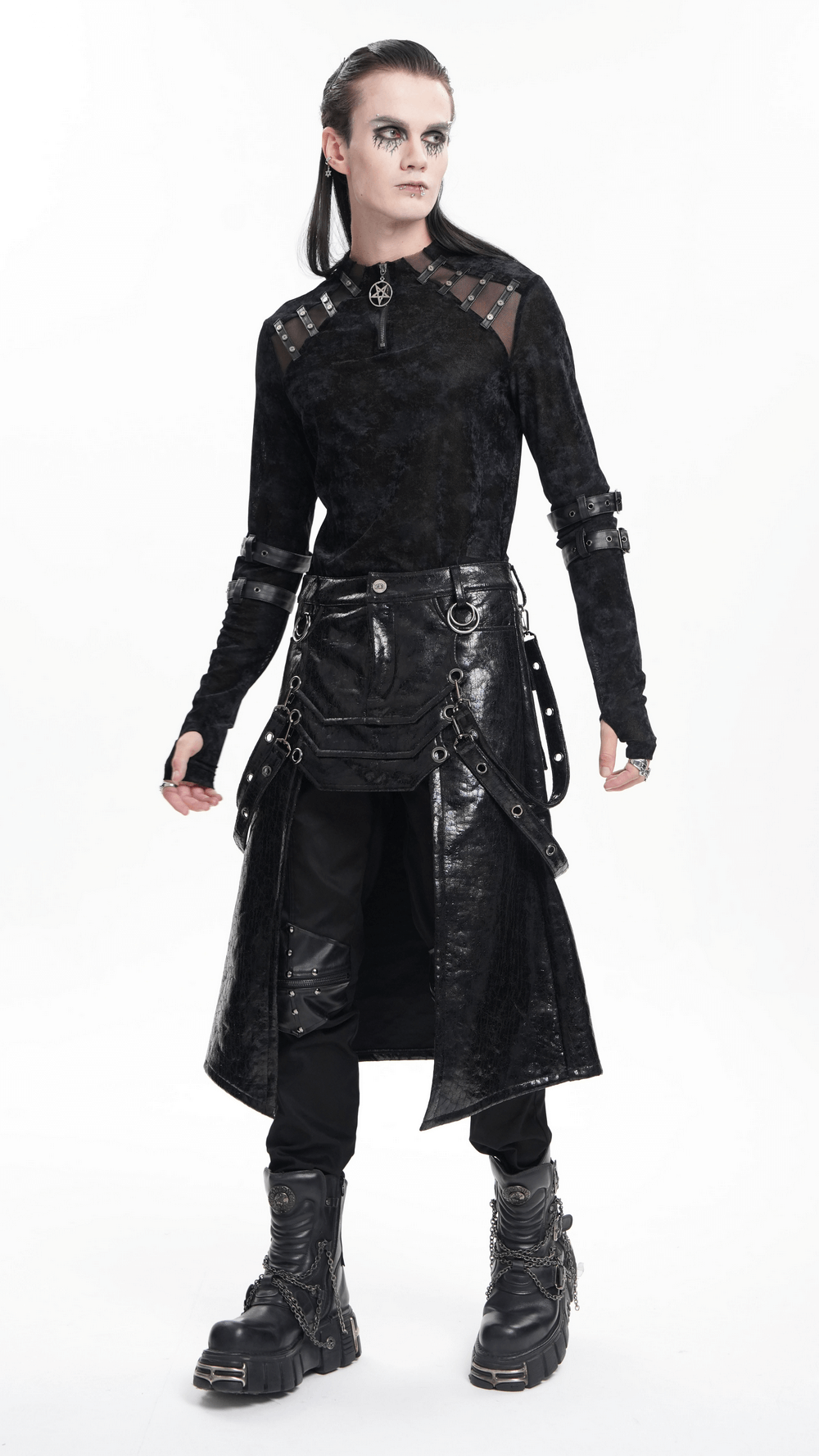 Model showcasing a gothic faux leather skirt with straps, buckles, and metal accents, styled for an edgy punk look.