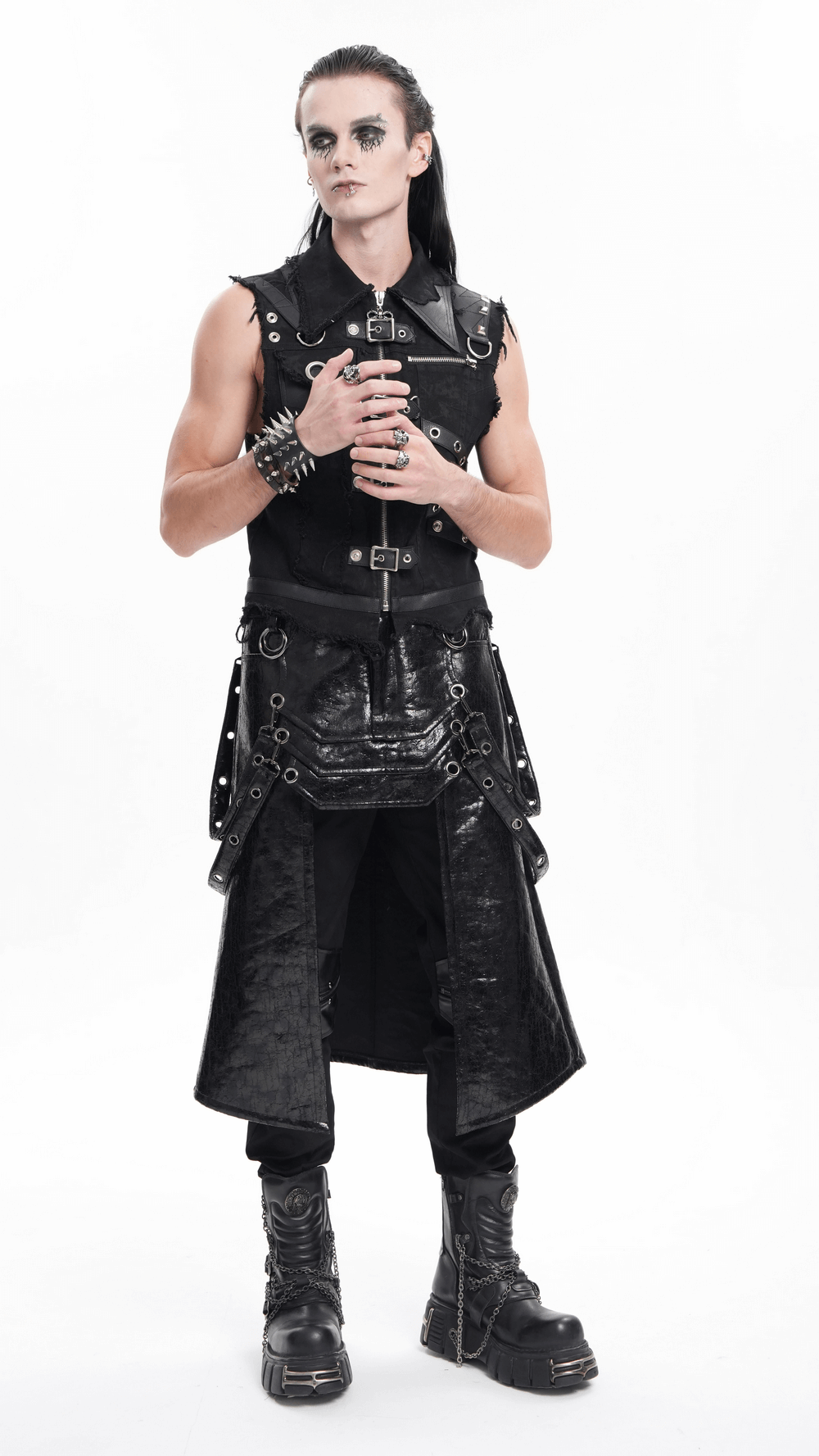 Edgy gothic faux leather skirt with straps, buckles, and metal accents, styled with punk accessories and combat boots.