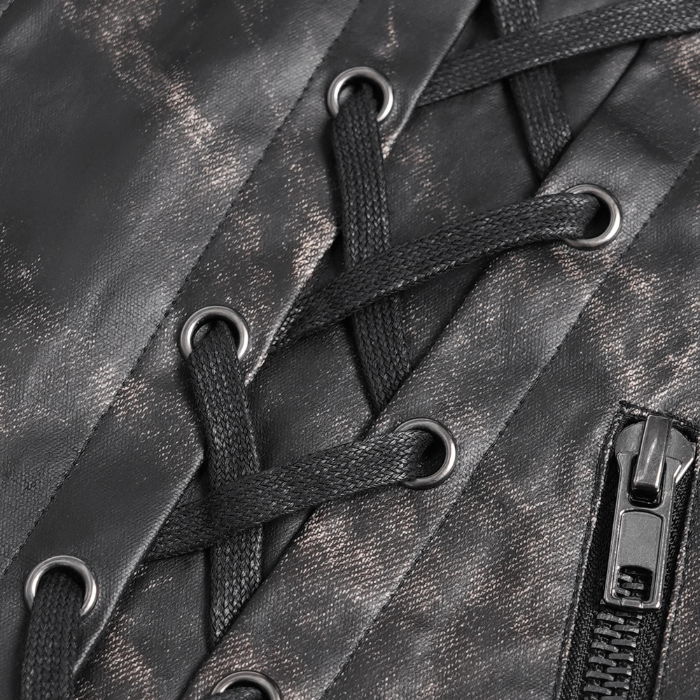 Close-up of gothic faux leather vest with lace-up sides and zipper details, showcasing punk rock style.