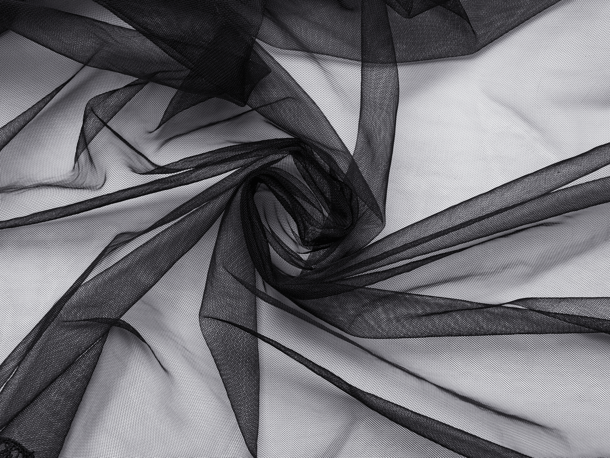 Black mesh fabric swirling in elegant folds, perfect for gothic and alternative fashion designs.