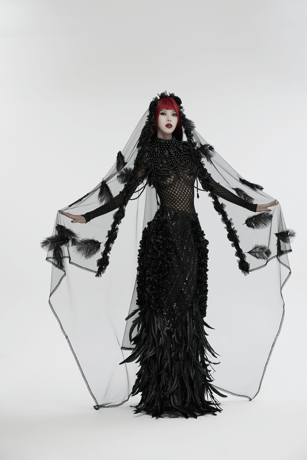Gothic feather and rose mesh veil model showcasing dynamic lace and feather details for a striking alternative look.