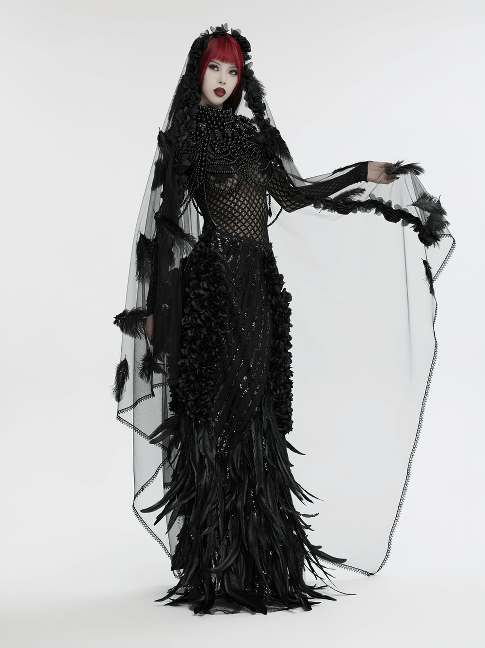 Gothic veil featuring 3D roses, feathers, and lace hem for a dramatic alternative look.