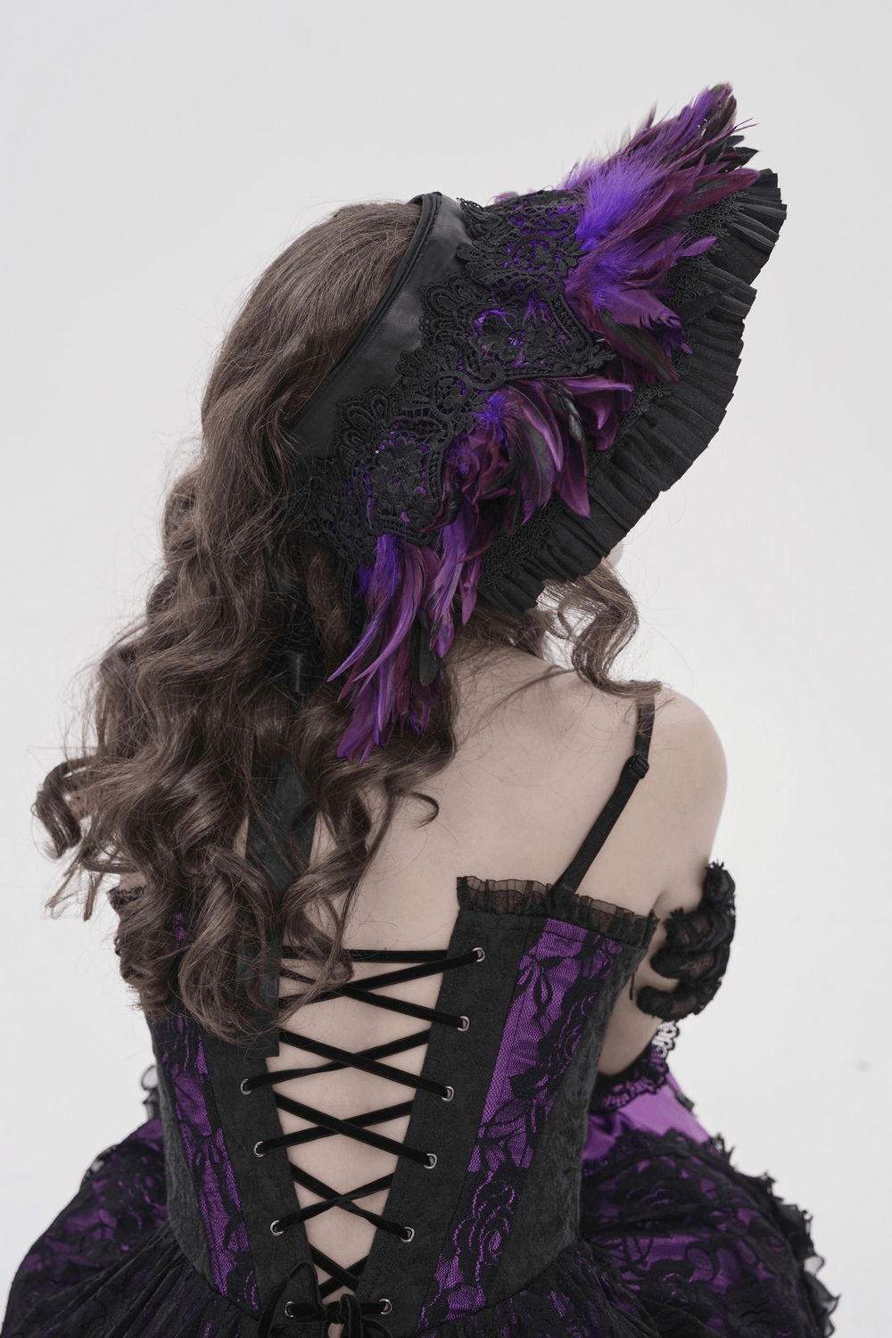 Gothic Feather Halo Bonnet Headdress for Women with purple feathers and black ruffles, adding a dramatic touch to any outfit.